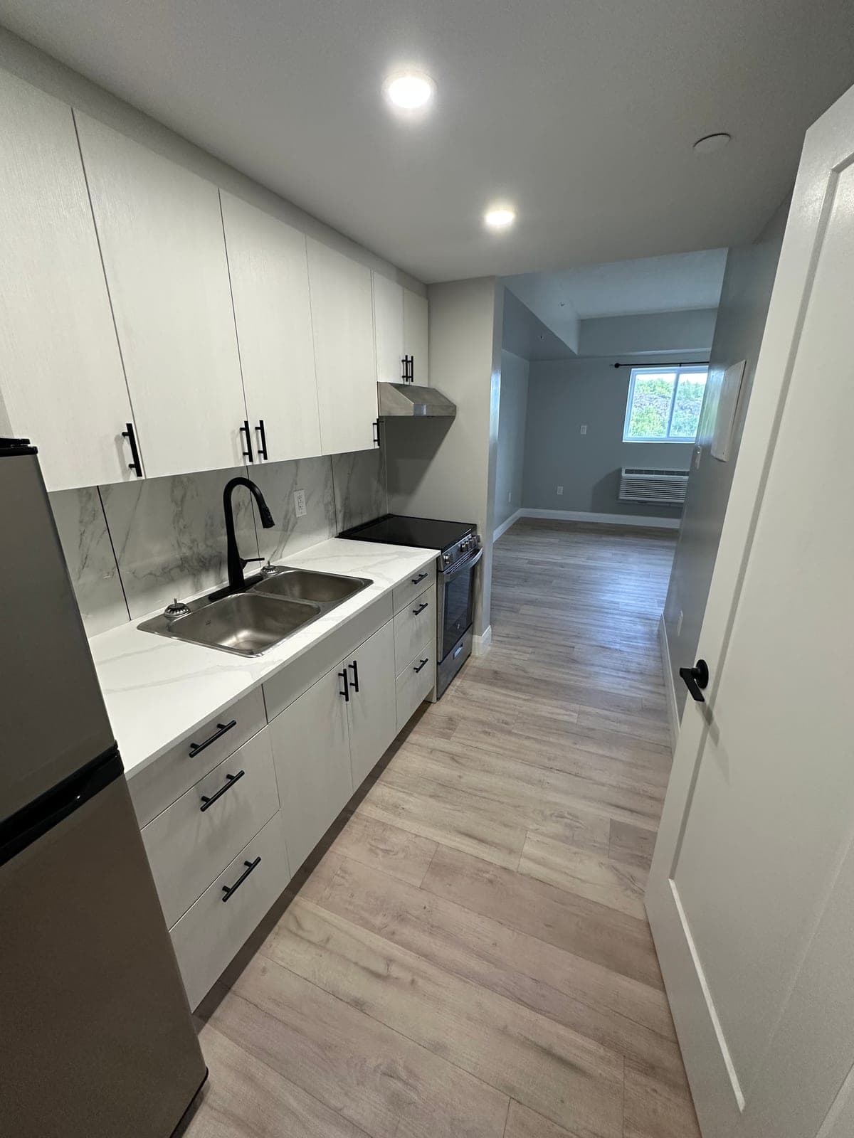 Bachelor Apartments (New Building) — unfurnished photo 1